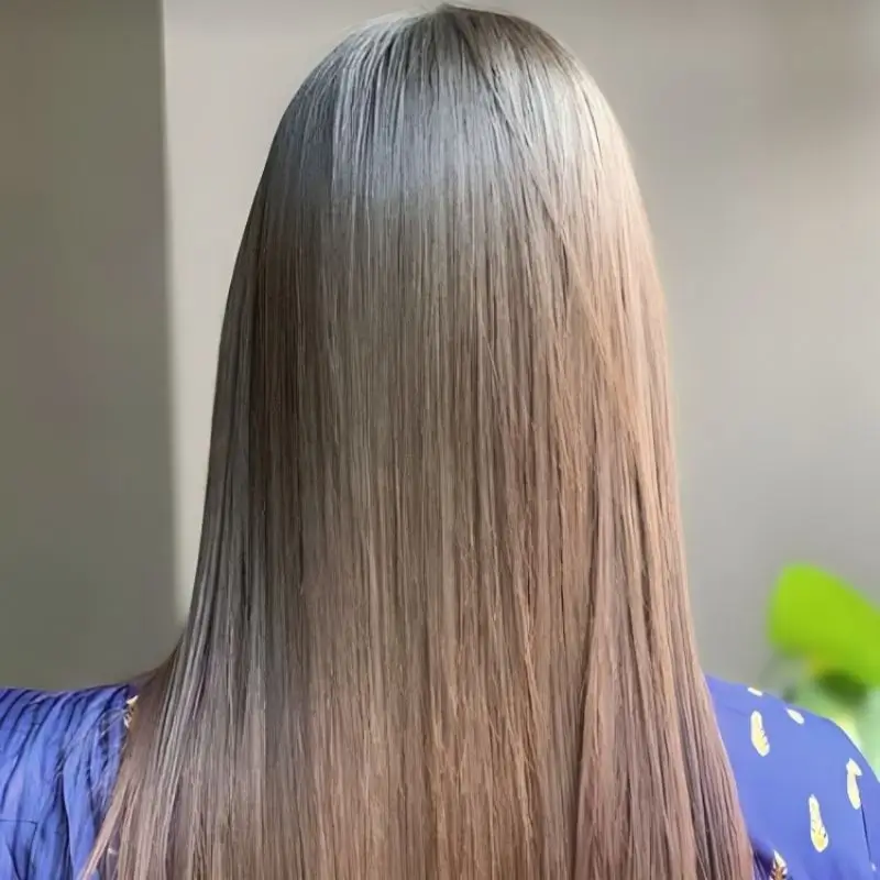 A girl get the best keratin treatment in Faisalabad from allure salon